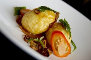 Gin Gin - Son-in-law eggs are served with crispy fried onions and a sweet Tamarind sauce.
