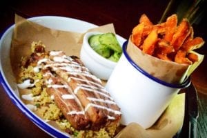 The 36-hour cooked lamb breast, served on a Moroccan-style couscous with sweet potato fries.